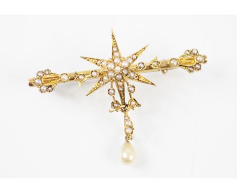 A Victorian seed pearl brooch, the central seed pearl set star with conforming decorated terminals, suspending a seed pearl s