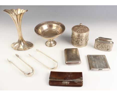 A selection of silver and white metal items, including a George V silver cigarette box, Horace Woodward &amp; Co, Birmingham 