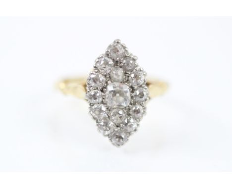A 20th century diamond marquise ring, the marquise designed head with fifteen old cut and mixed cut diamonds set within a whi