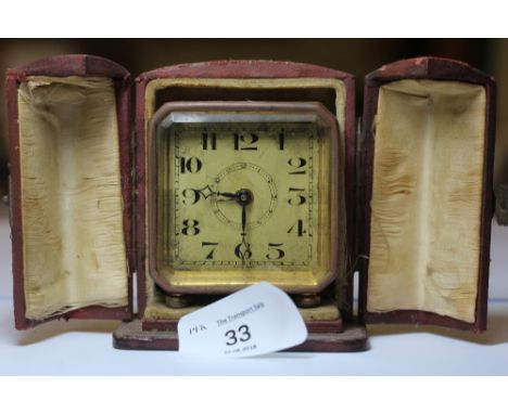 1930s G/M Swiss made travelling alarm clock (cased)