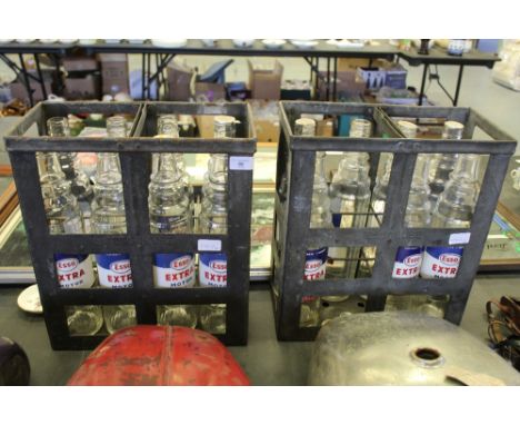 Two 'Essolube' metal crates containing 15 bottles of Esso extra motor oil (empty)