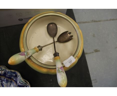 Vintage salad bowl with metal rim stamped A.M. and pair of matching servers