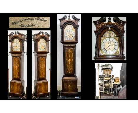 A Large Exhibition Type Longcase or 'Grandfather' Clock with a three train movement on eight chiming bells, supported by thre