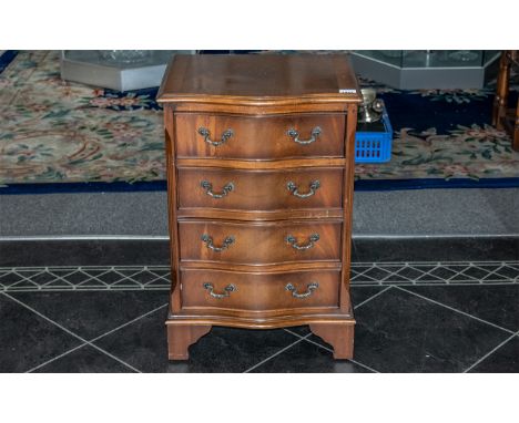 Small Reproduction Mahogany Serpentine Fronted Chest of Drawers with graduated drawers with fitted brass snake drop handles, 