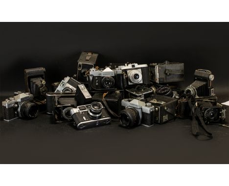Box of Vintage Cameras of various makes.  6 x Brownies, a Pentax, a Sunpack DC4, 2 x Praktica, a Ricohflex, a Conway, 3 x Kod