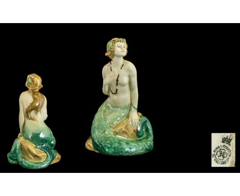 Royal Doulton Early Handpainted Figure stamped 1918. 'The Mermaid' green / cream colour way. HN 97. Designer H. Tittensor. Is