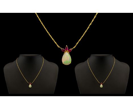 Unmarked Ruby &amp; Opal Necklace.  Three Marquise cut rubies above a pear shaped opal (12 x 8 mm) suspended on a 15" fancy l