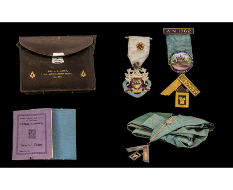 Masonic Apron with Sash - with medal attached, and Masonic Books in briefcase, along with two Masonic medals in a pouch.  Ple