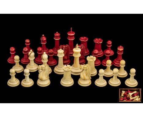Carved And Turned Ivory Staunton Pattern Chess Set. One Side Natural Ivory The Other Stained Red. The Kings Stand Three Inche