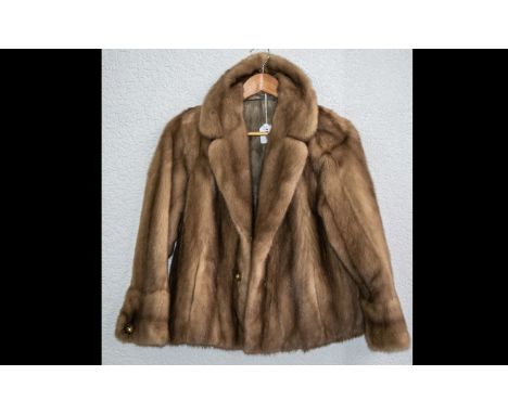 Ladies Mink Jacket Pale Honey colour.  Button fastening, two slit openings to back, lined in patterned beige sateen fabric.  