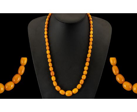 String of Vintage Graduated Butterscotch Amber Coloured Beads, with marbling patina, weight 28.4 grams.  Please see accompany