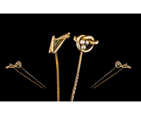 Antique Period 15 ct Gold Seed Pearl Set Stick Pin Marked 15ct together with a 9ct Gold Stick Pin surmounted by a miniature h