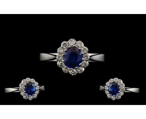 18ct White Gold 1950's Sapphire and Diamond Set Cluster Ring the central faceted sapphire of excellent rich blue colour surro