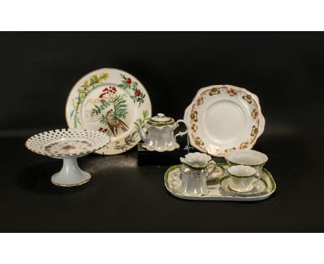 A Collection of Ceramics to include a ceramic cake stand decorated with pink roses with a lattice edge, a Caverswall China 'A