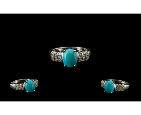 Sleeping Beauty Turquoise and White Zircon Ring, an oval cut cabochon of over 2cts of the bright, matrix free, turquoise from