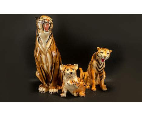 A Collection of Three Modern Ceramic Decorative Tiger Figures comprising of tall sitting tiger measuring 25 inches high, a cr