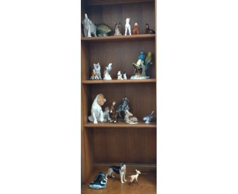 Ceramic animals and birds by various makers including Denton, Wade, Sylvac, and Beswick. (22) 