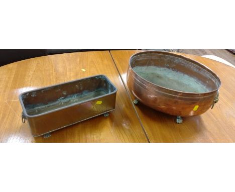 A copper jardiniere with lion mask handles 39cm, window trough and pewter tankards. 