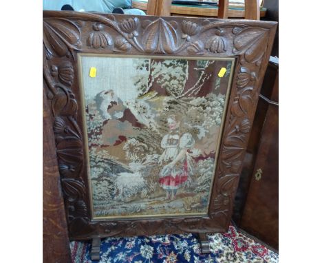 An Antique Tapestry fire screen. 75cm x 57cm 