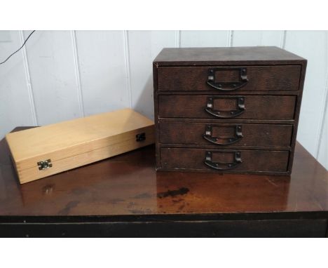 A vintage office stationery small four-drawer chest 27cm high x 32cm wide x 25cm deep, and a German wooden filing box 38cm wi