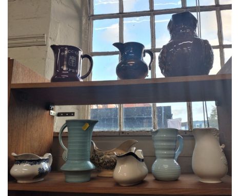 Nine ceramic jugs including Lovatts deco jug and a pale turquoise art deco jug (9) 