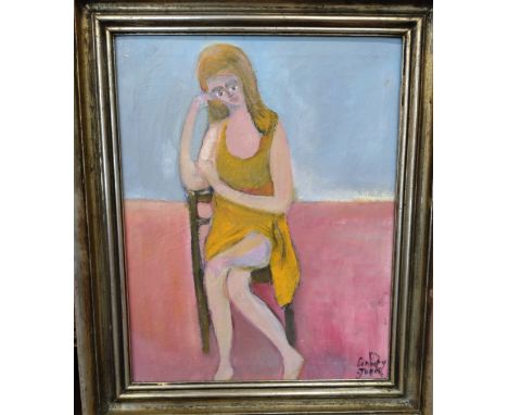 Girl on a chair. Portrait of a girl seated. 