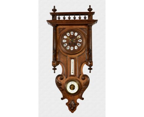 A late 19th century French wall clock with barometer and thermometer the mahogany and stained beechwood case with balustrade 