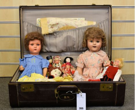 An original Ideal composition headed 'Shirley Temple' doll 1930's, sleeping eyes & open mouth, extra clothes, in good conditi