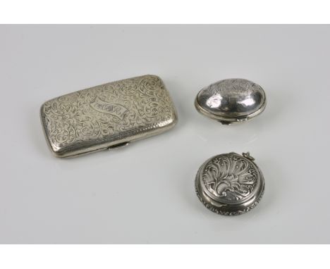 Three silver boxes comprising a cheroot case of rounded rectangular form, profusely chased with foliate design, scroll cartou