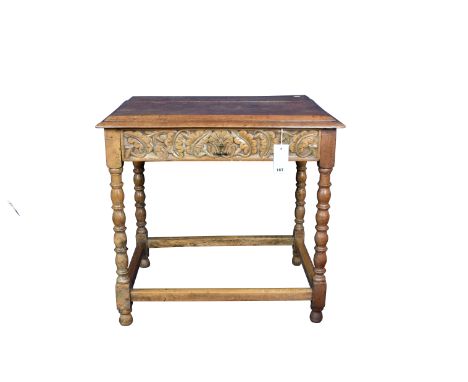 An 18th century oak side table with recangular moulded top over single frieze drawer raised on bobbin turned and square suppo