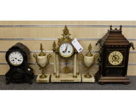 Three antique clocks for restoration comprising a 19th century French gilt metal and onyx clock garniture (over wound); Mahog
