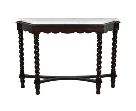 A mahogany and marble breakfront console table early 20th century, the grey mottled white marble top over a scalloped frieze,