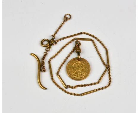 A George V full gold sovereign (pierced) with 15ct gold Albert chain (tested) - gross weight 17g.  