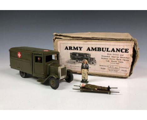 A Britains lead No. 1512 Army Ambulance Khaki,&nbsp;with patient on stretcher, driver and additional nurse figure, in origina