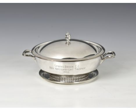 An American silver card tray of circular form, 7in. (17.8cm.) diameter, weight 4.5 tr.oz.; together with an American silver p