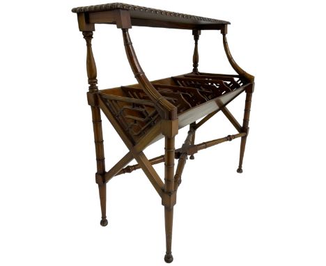 Early 20th century Chippendale design mahogany booktrough, top-tier with gadrooned edge, the trough fitted with trapezoid fre