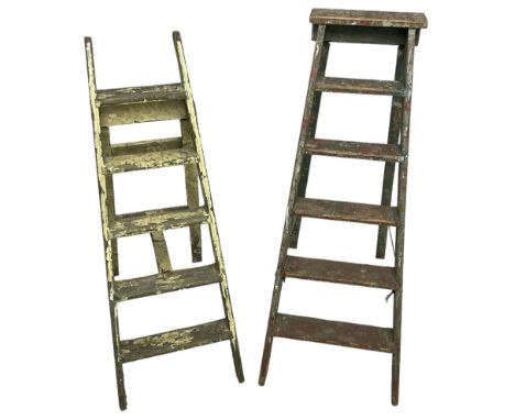 Late 19th century painted pine six tread library or shop step ladder (W52cm H136cm); together with another similar (W45cm H12