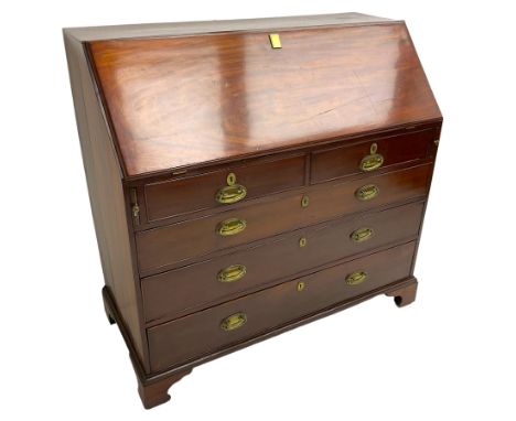 George III mahogany bureau, fall front enclosing interior fitted with pigeon holes, drawers and cupboard, two short and three