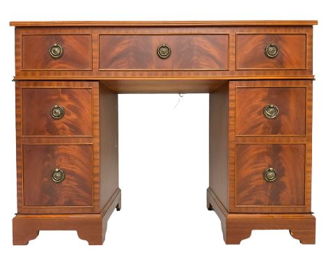 Music system in the form of a Georgian design twin pedestal desk, the reed moulded rectangular top hinges to reveal Garrard t