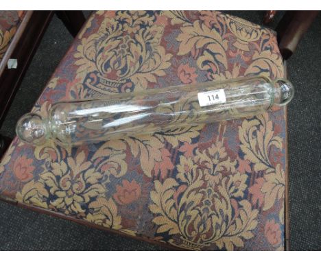 A Victorian clear glass rolling pin