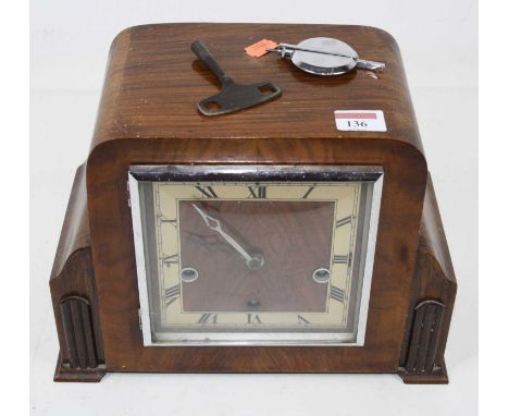 An Art Deco walnut, chiming, 8-day mantel clock, the silvered chapter ring showing Roman numerals, height 22cm