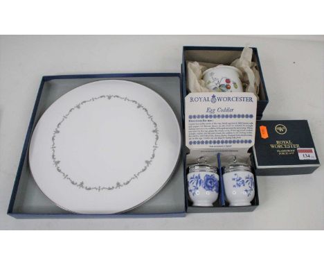 A Royal Worcester Strawberry Fair pattern porcelain jar and cover, together with a pair of Royal Worcester egg coddlers, and 