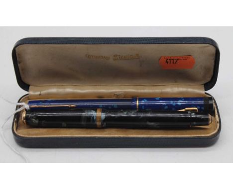 A Parker Duofold fountain pen, having a 14ct gold nib and faux marble cap and barrel, with gilt arrow clip; together with The