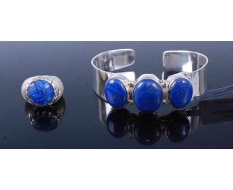 A modern sterling silver and lapis lazuli set dress ring, size N, together with sterling silver and lapis lazuli set bangle (