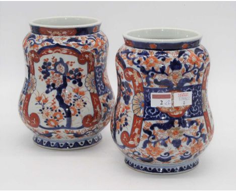 A pair of 20th century Japanese Imari vases, each of albarello form, height 21cm