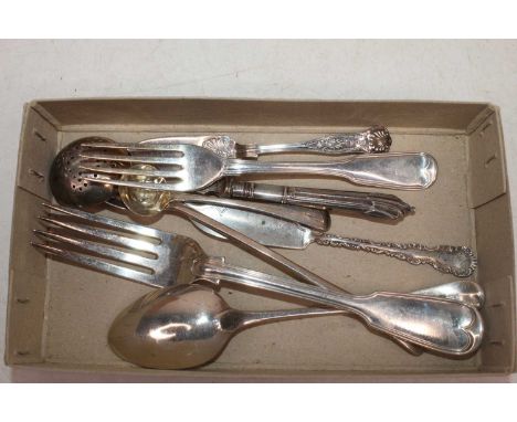 A Victorian silver table fork, in the Fiddle &amp; Thread pattern; together with various other loose silver and white metal f