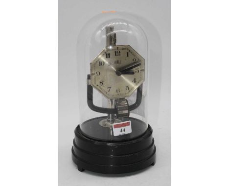An early 20th century Bulle electric anniversary style mantel clock housed under a glass dome, height 26cmCondition report: N