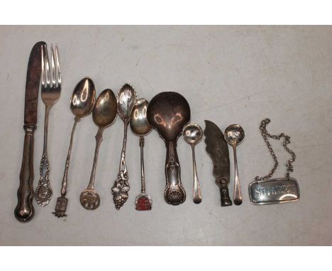 A small collection of miscellaneous silver and white metal items, to include a Victorian silver caddy spoon, George V decante