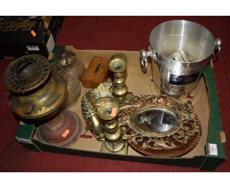 A box of miscellaneous items to include pair of Victorian brass table candlesticks, brass tea caddy, and a plated champagne c