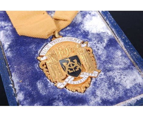A 9ct gold and enamel set masonic jewel for the Vice President inscribed verso W Peebles 1966 with unmarked yellow metal bale